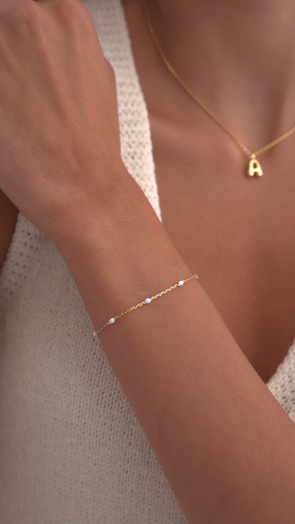 #Variant_Yellow Gold / White Enamel